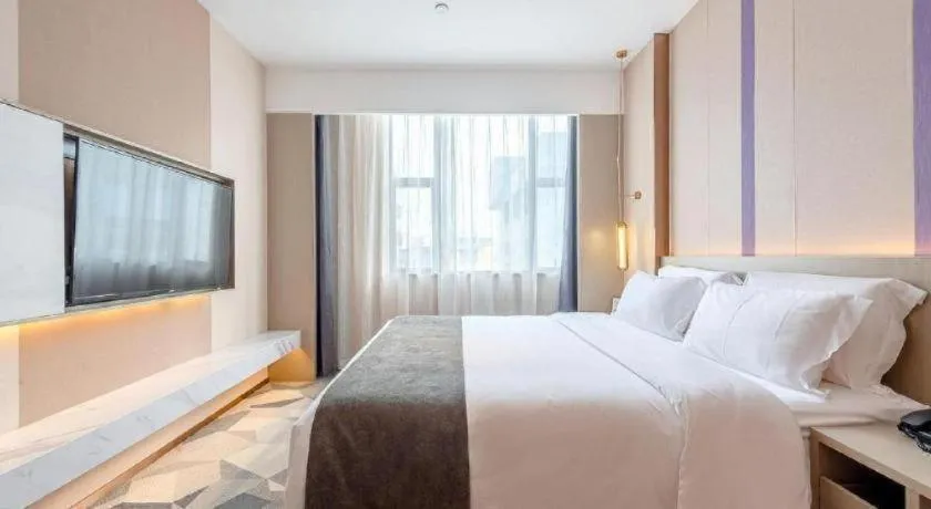 Bed in Lavande Hotel Zhongshan Shiqi Daxinxinduhui North Zhongshan Station