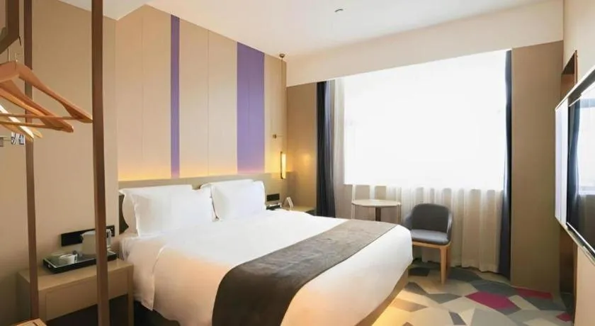 Bed in Lavande Hotel Zhongshan Shiqi Daxinxinduhui North Zhongshan Station