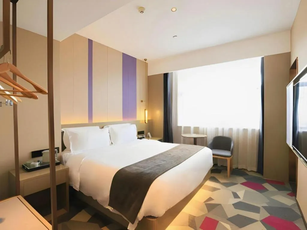 Bed in Lavande Hotel Zhongshan Shiqi Daxinxinduhui North Zhongshan Station