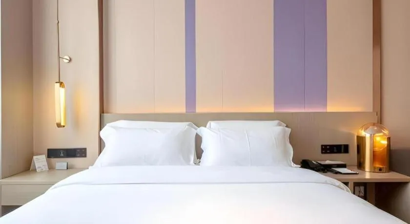 Bed in Lavande Hotel Zhongshan Shiqi Daxinxinduhui North Zhongshan Station