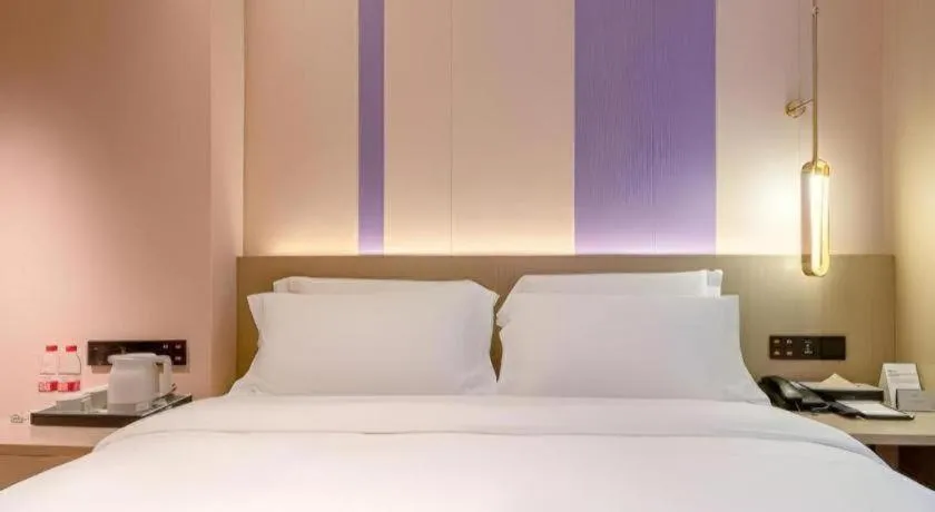 Bed in Lavande Hotel Zhongshan Shiqi Daxinxinduhui North Zhongshan Station