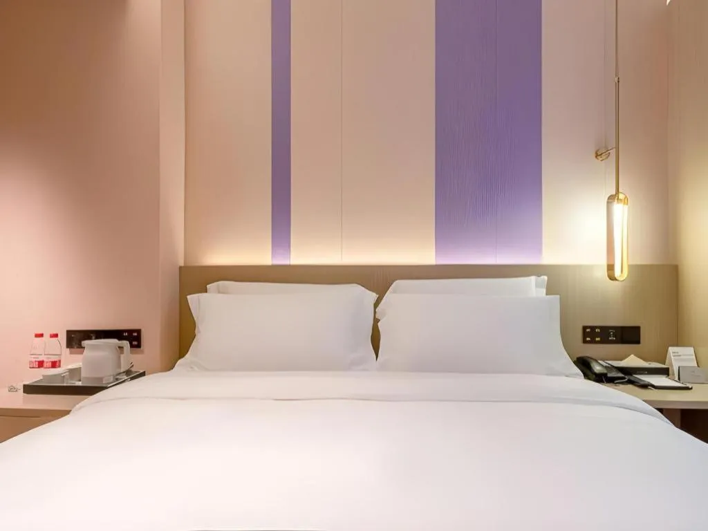 Bed in Lavande Hotel Zhongshan Shiqi Daxinxinduhui North Zhongshan Station