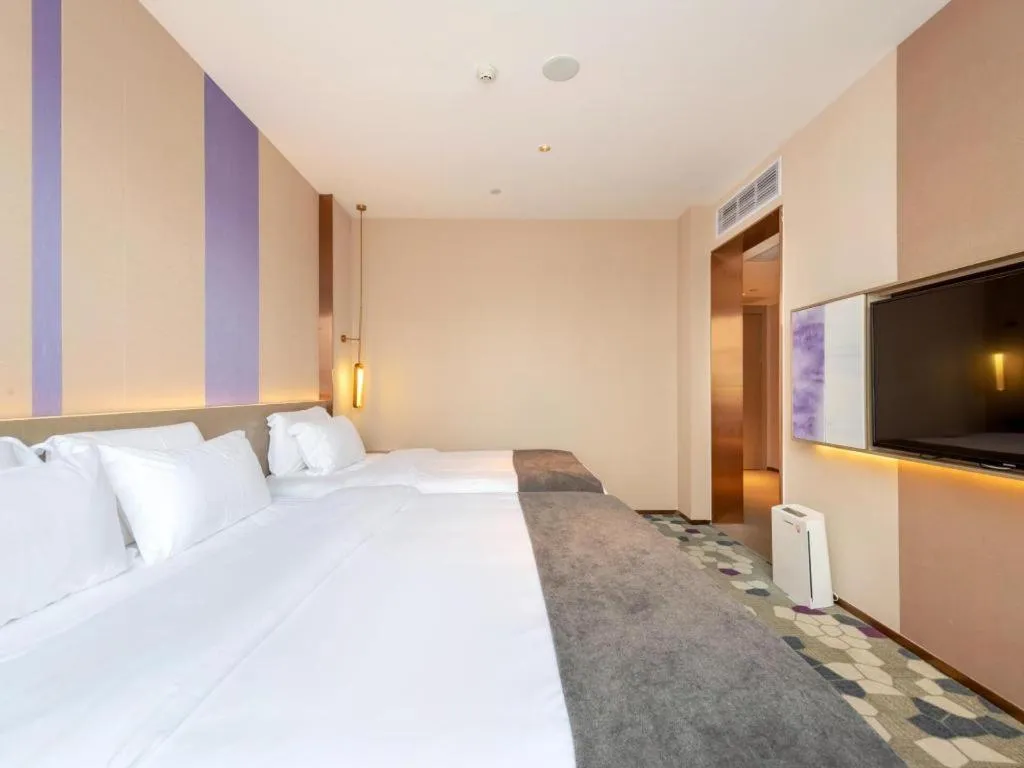 Bed in Lavande Hotel Zhongshan Shiqi Daxinxinduhui North Zhongshan Station
