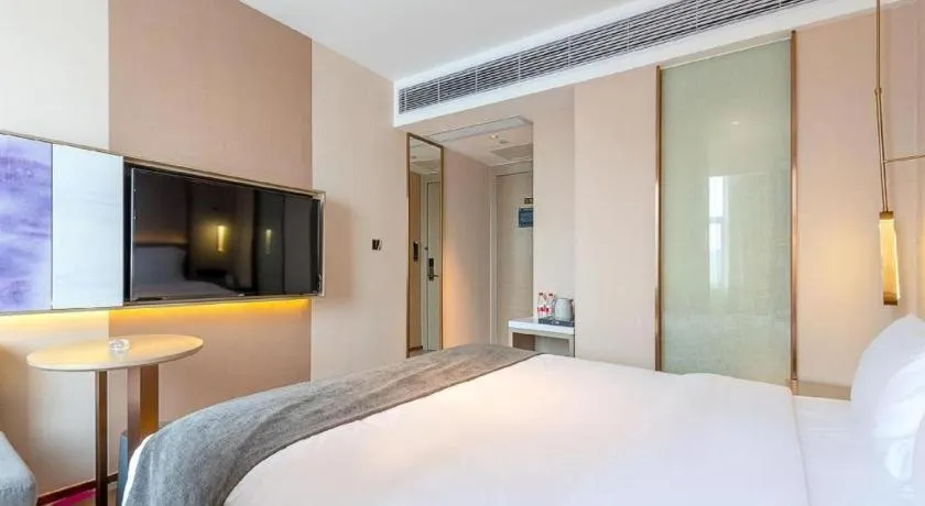 Bed in Lavande Hotel Zhongshan Shiqi Daxinxinduhui North Zhongshan Station