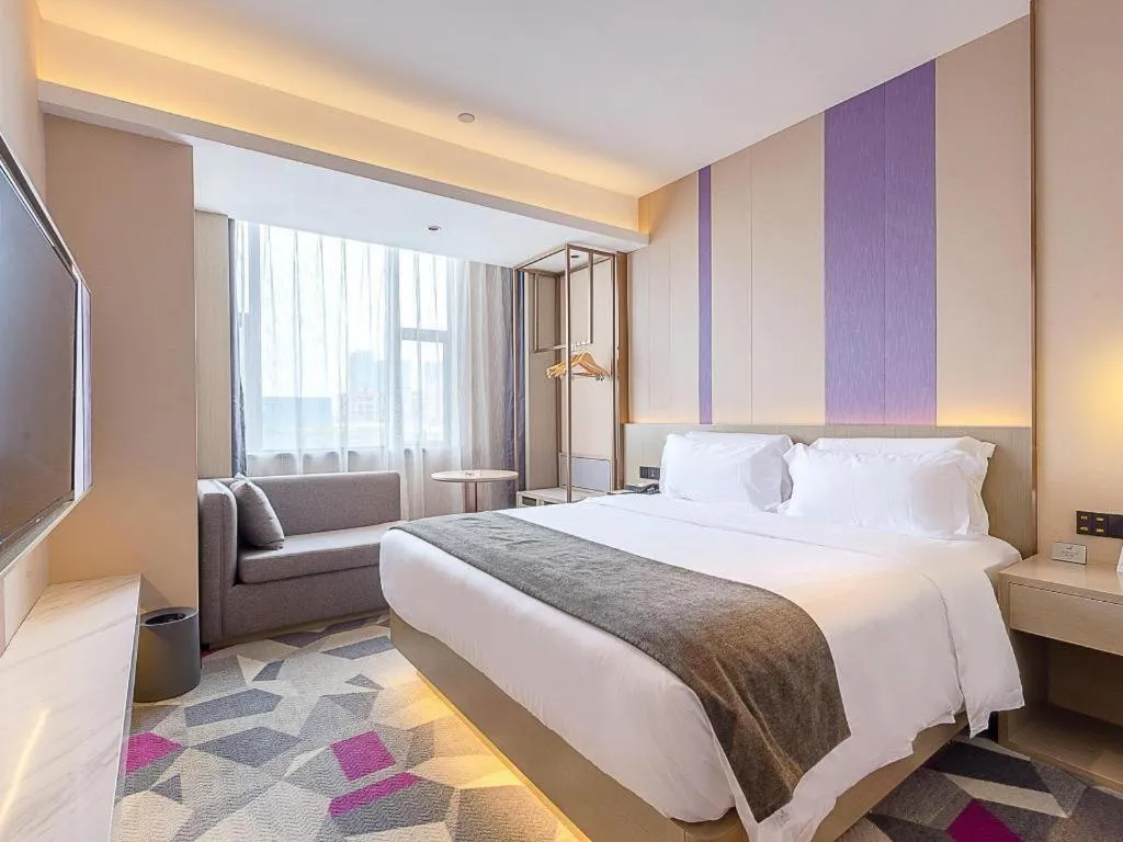 Bed in Lavande Hotel Zhongshan Shiqi Daxinxinduhui North Zhongshan Station