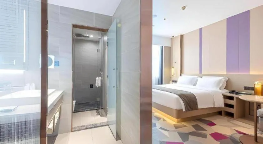 Bed in Lavande Hotel Zhongshan Shiqi Daxinxinduhui North Zhongshan Station