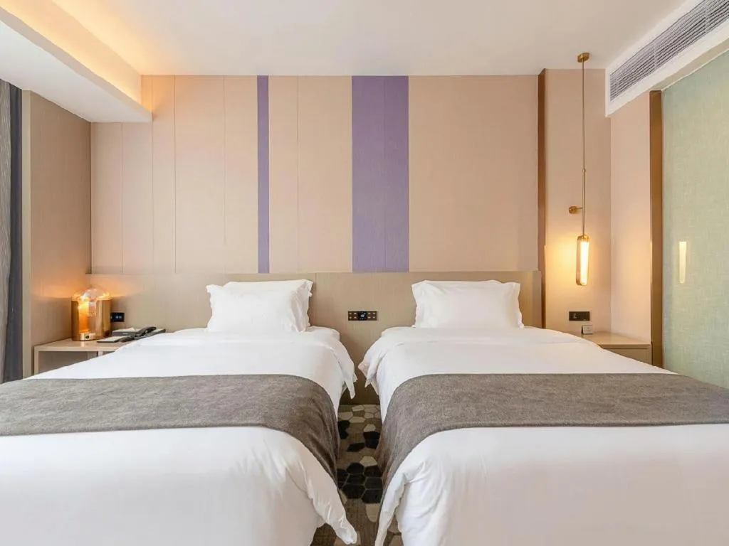 Bed in Lavande Hotel Zhongshan Shiqi Daxinxinduhui North Zhongshan Station