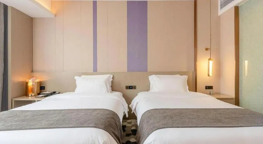 Bed in Lavande Hotel Zhongshan Shiqi Daxinxinduhui North Zhongshan Station