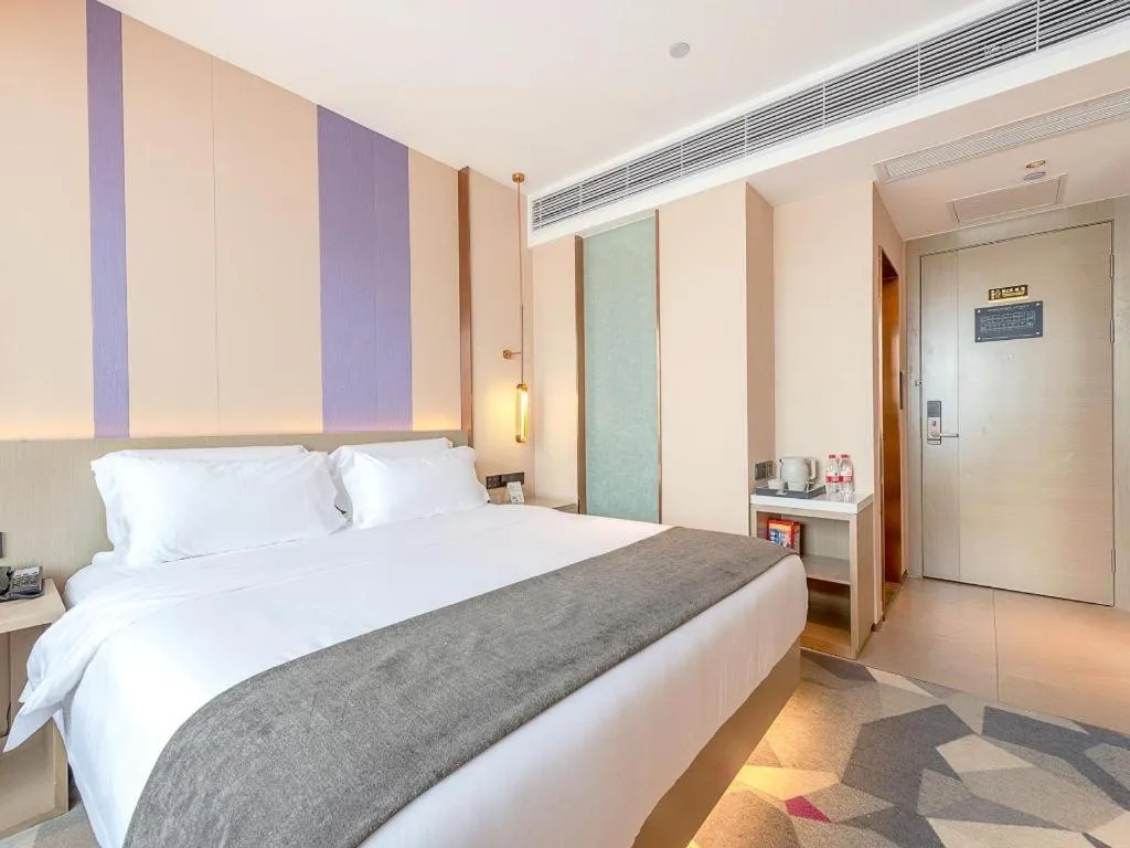 Bed in Lavande Hotel Zhongshan Shiqi Daxinxinduhui North Zhongshan Station