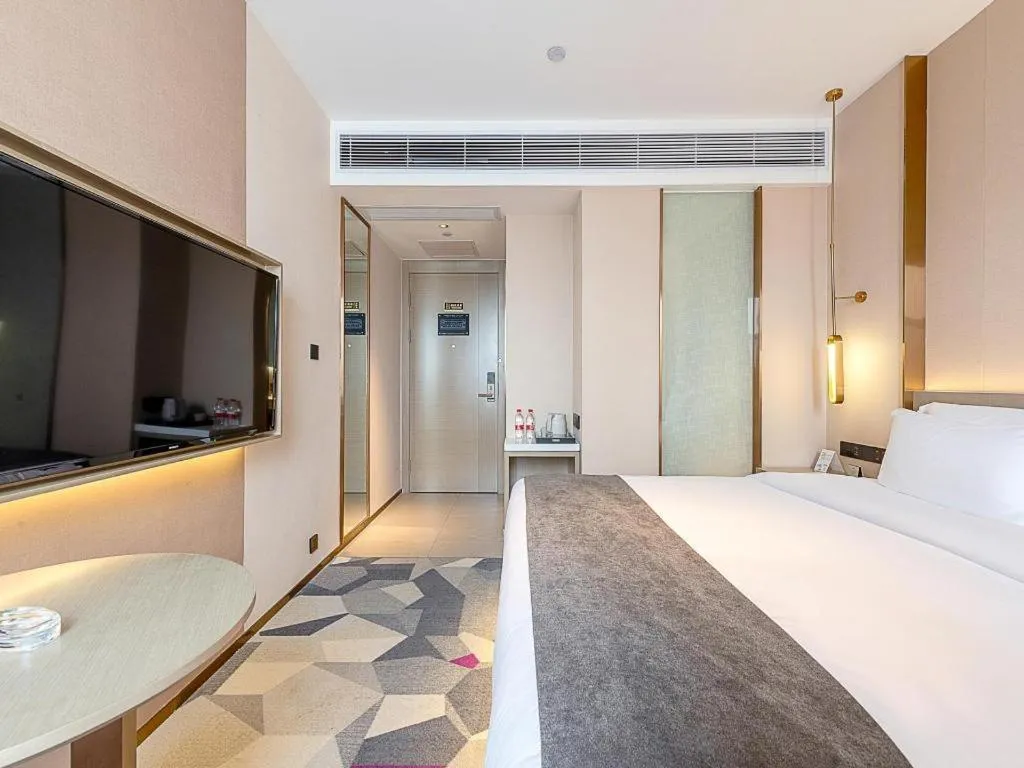Bed in Lavande Hotel Zhongshan Shiqi Daxinxinduhui North Zhongshan Station
