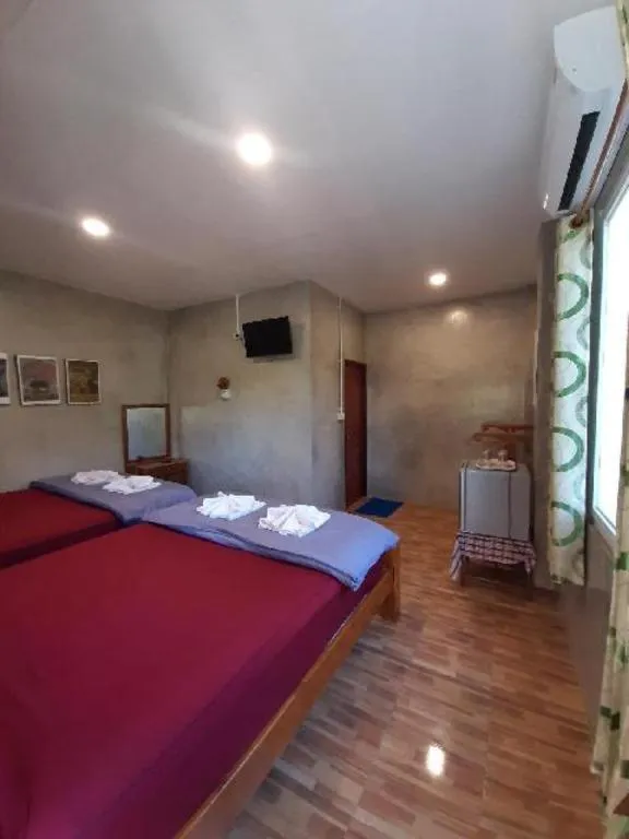 Bed in HotelBanAunirukChiangrai