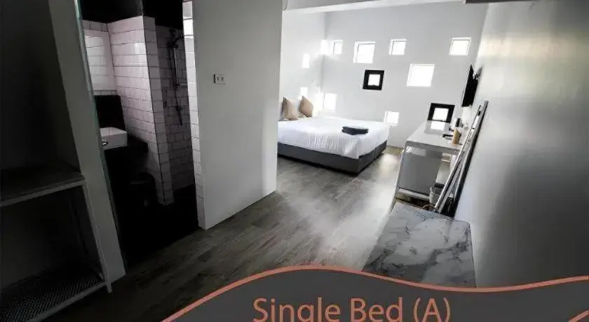 Bed in Kaoseng Rockhill Hotel Bed in Kaoseng Rockhill Hotel