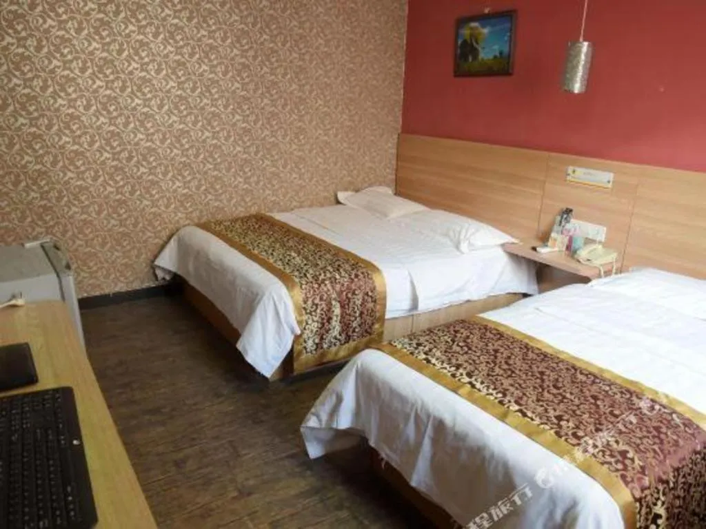 Bed in Super 8 Hotel Beijing South Railway Station Majiabao Metro Station