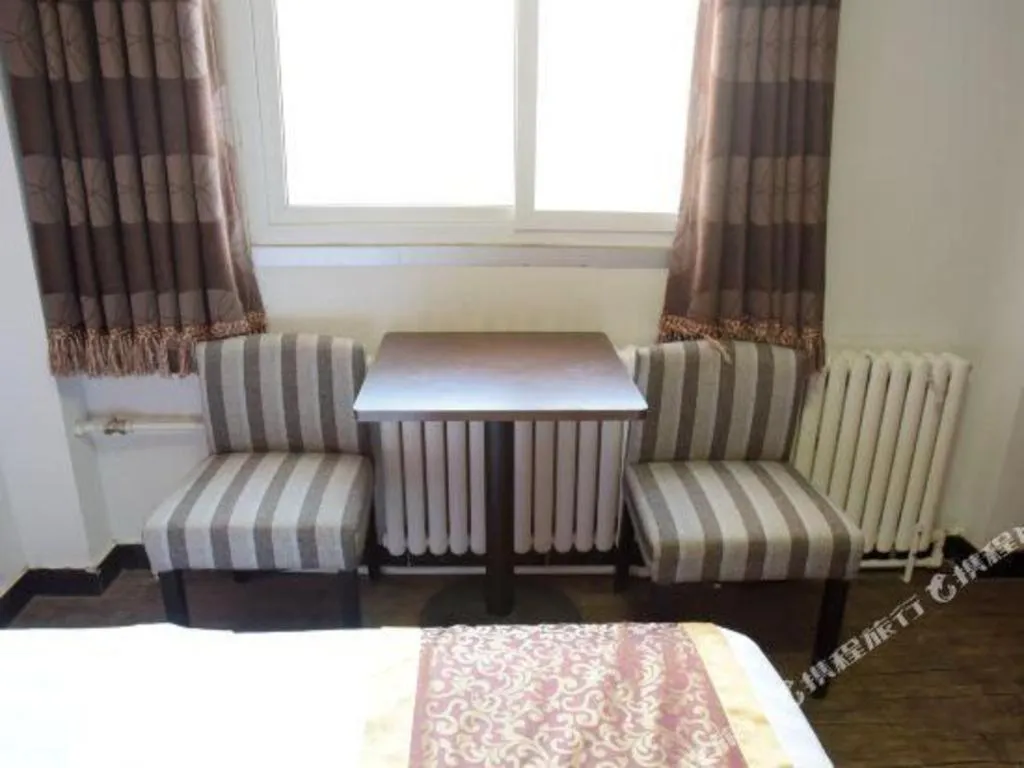 Bed in Super 8 Hotel Beijing South Railway Station Majiabao Metro Station