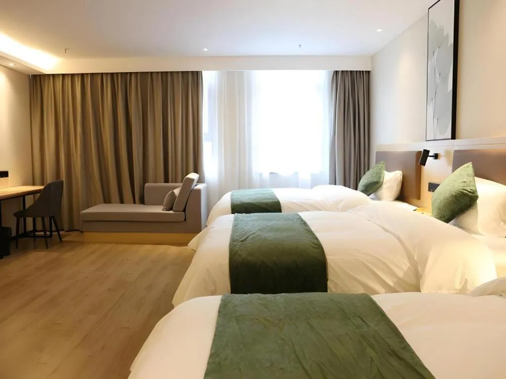 Bed in Green Tree Inn Express Chizhou Gymnasium