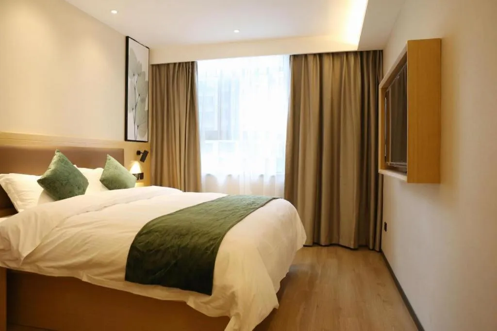 Bed in Green Tree Inn Express Chizhou Gymnasium