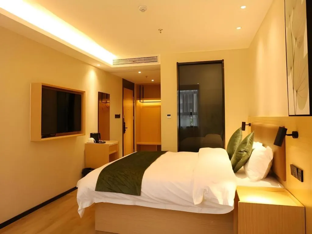Bed in Green Tree Inn Express Chizhou Gymnasium