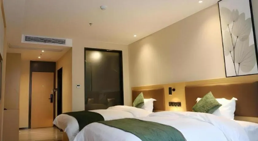 Bed in Green Tree Inn Express Chizhou Gymnasium