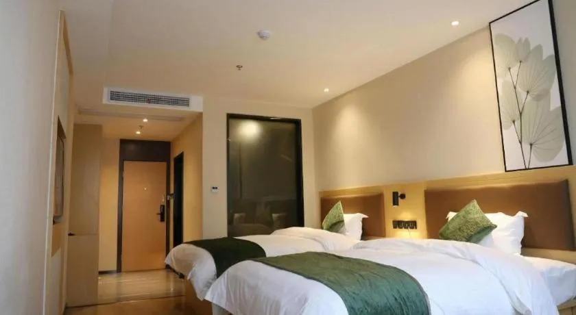 Bed in Green Tree Inn Express Chizhou Gymnasium