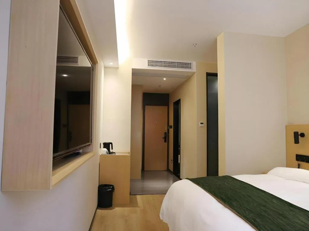 Bed in Green Tree Inn Express Chizhou Gymnasium