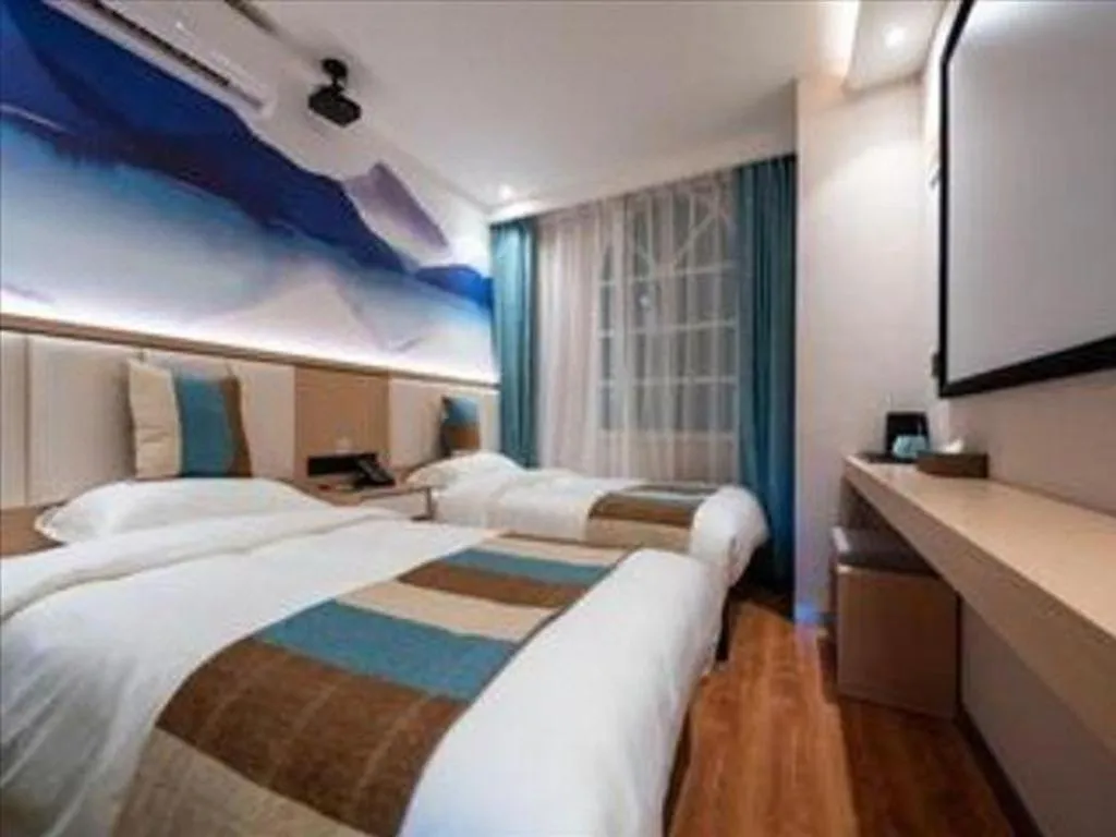 Bed in VX Hotel Beijing Daxing Wufutang Metro Station Zhongke Dianshanggu