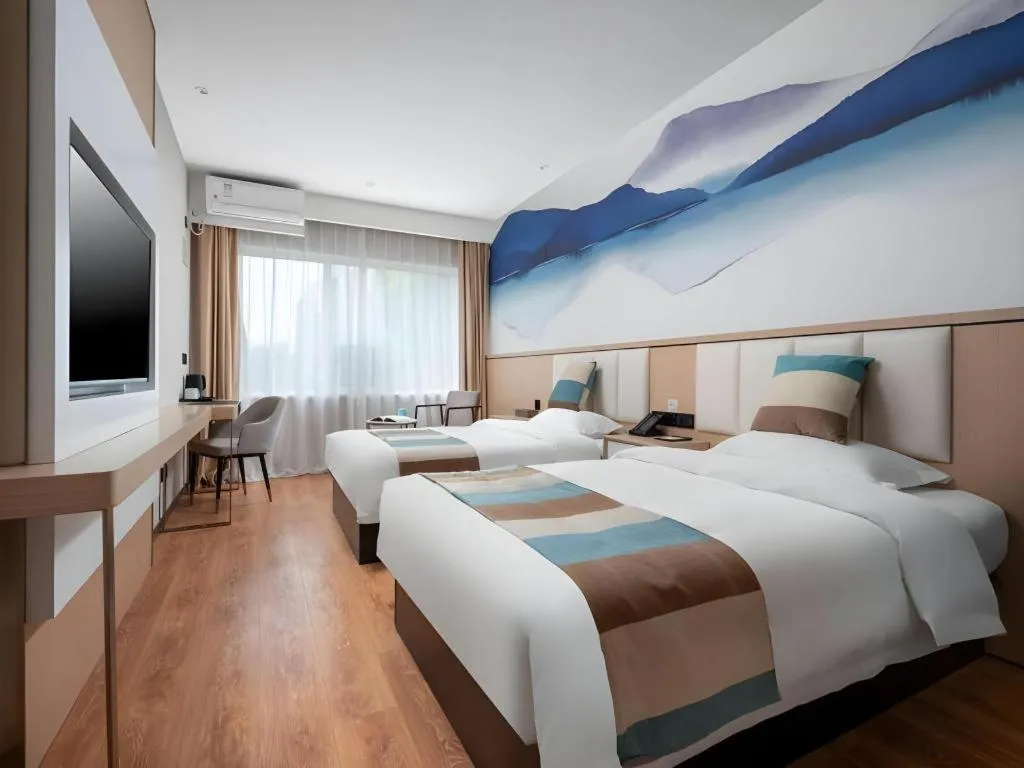 Bed in VX Hotel Beijing Daxing Wufutang Metro Station Zhongke Dianshanggu