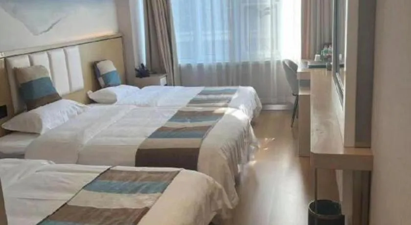 Bed in VX Hotel Beijing Daxing Wufutang Metro Station Zhongke Dianshanggu