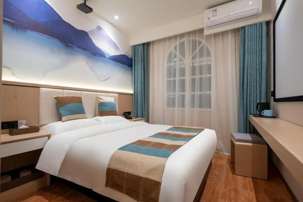 Bed in VX Hotel Beijing Daxing Wufutang Metro Station Zhongke Dianshanggu