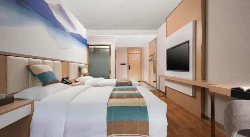 Bed in VX Hotel Beijing Daxing Wufutang Metro Station Zhongke Dianshanggu