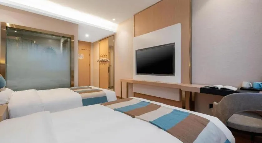 Bed in VX Hotel Beijing Daxing Wufutang Metro Station Zhongke Dianshanggu