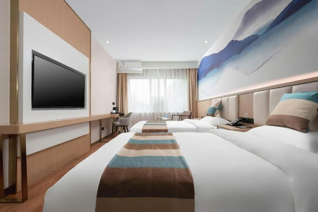 Bed in VX Hotel Beijing Daxing Wufutang Metro Station Zhongke Dianshanggu