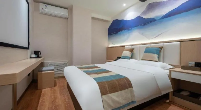 Bed in VX Hotel Beijing Daxing Wufutang Metro Station Zhongke Dianshanggu