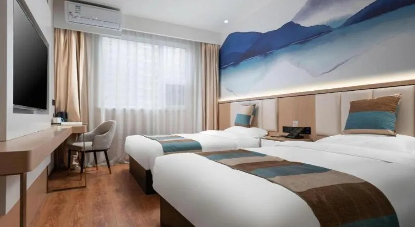 Bed in VX Hotel Beijing Daxing Wufutang Metro Station Zhongke Dianshanggu