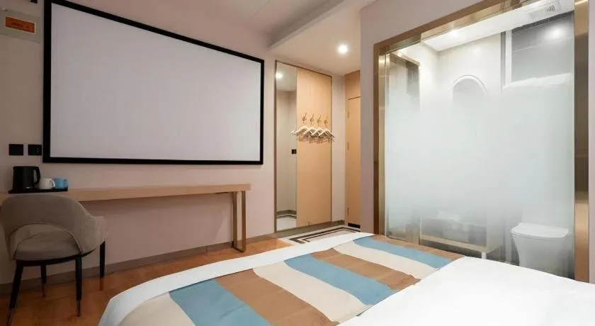 Bed in VX Hotel Beijing Daxing Wufutang Metro Station Zhongke Dianshanggu