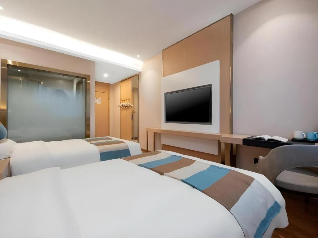 Bed in VX Hotel Beijing Daxing Wufutang Metro Station Zhongke Dianshanggu