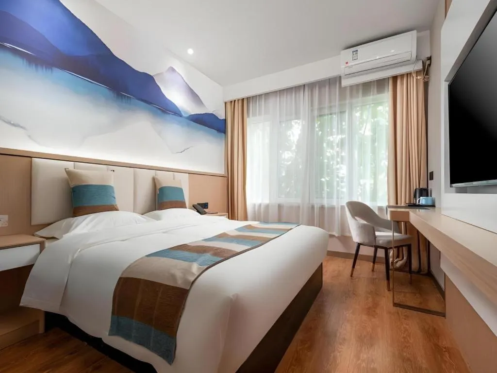 Bed in VX Hotel Beijing Daxing Wufutang Metro Station Zhongke Dianshanggu