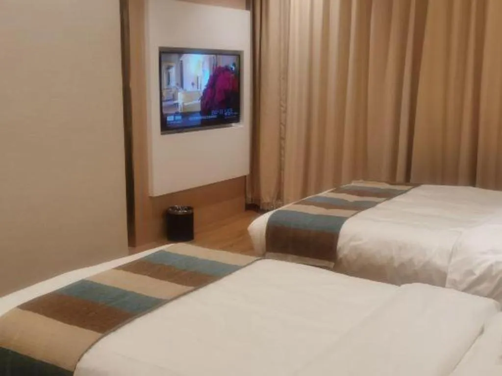 Bed in VX Hotel Beijing Daxing Wufutang Metro Station Zhongke Dianshanggu