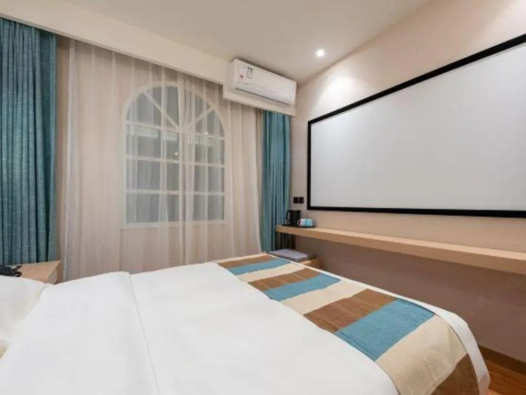 Bed in VX Hotel Beijing Daxing Wufutang Metro Station Zhongke Dianshanggu