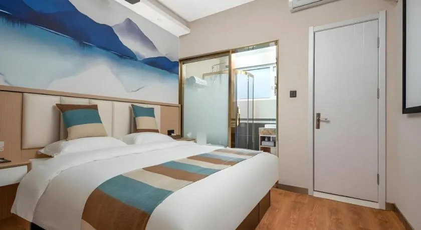 Bed in VX Hotel Beijing Daxing Wufutang Metro Station Zhongke Dianshanggu