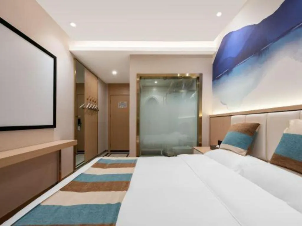 Bed in VX Hotel Beijing Daxing Wufutang Metro Station Zhongke Dianshanggu