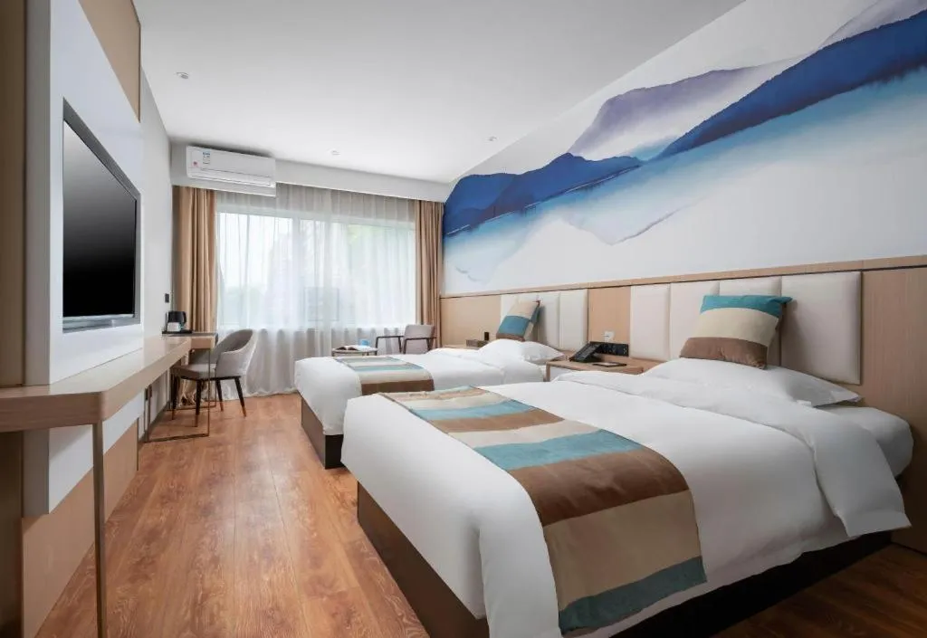 Bed in VX Hotel Beijing Daxing Wufutang Metro Station Zhongke Dianshanggu