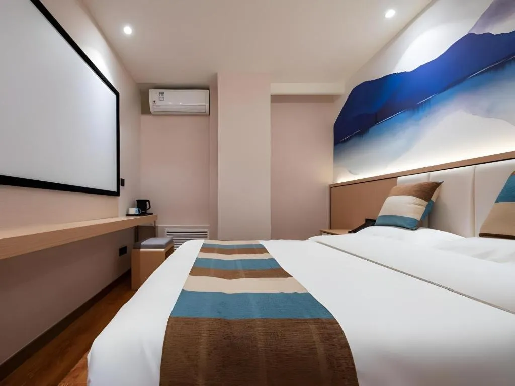 Bed in VX Hotel Beijing Daxing Wufutang Metro Station Zhongke Dianshanggu