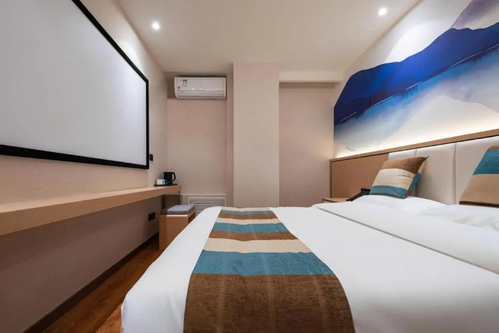 Bed in VX Hotel Beijing Daxing Wufutang Metro Station Zhongke Dianshanggu