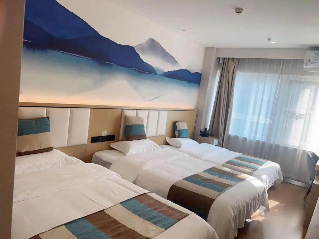 Bed in VX Hotel Beijing Daxing Wufutang Metro Station Zhongke Dianshanggu