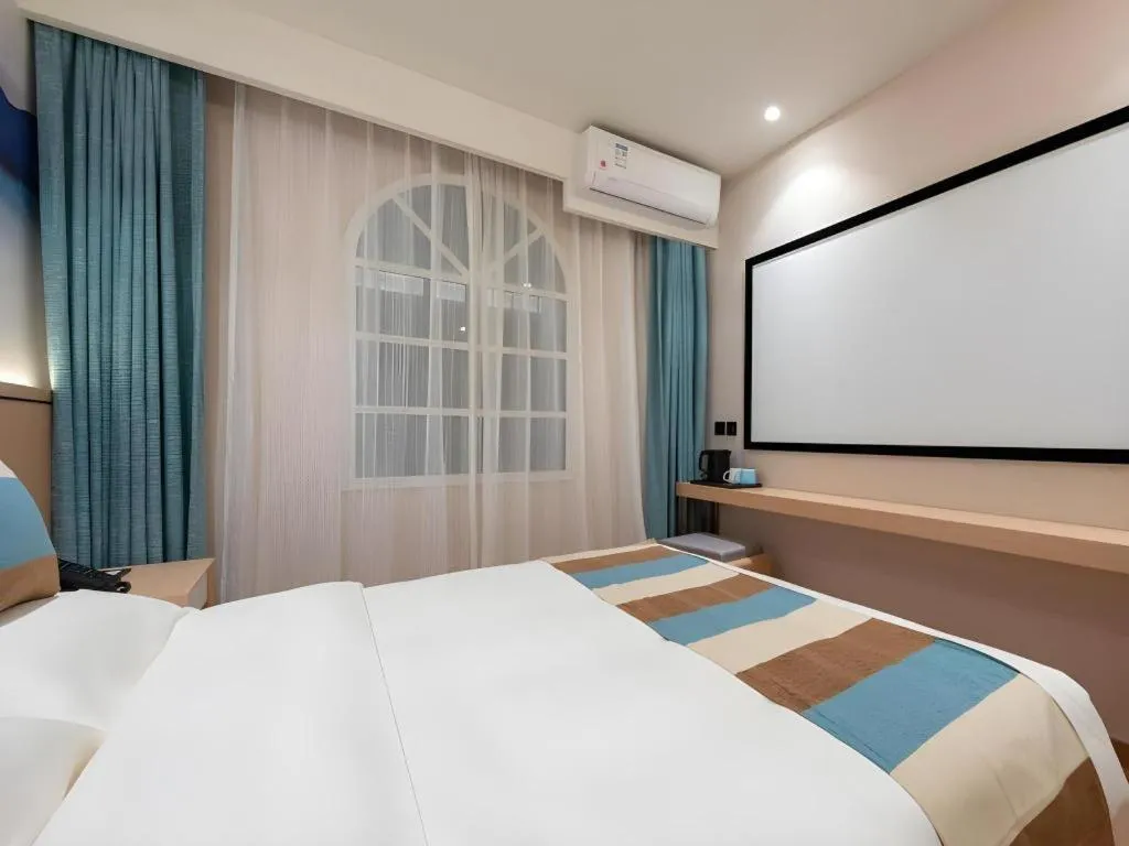 Bed in VX Hotel Beijing Daxing Wufutang Metro Station Zhongke Dianshanggu