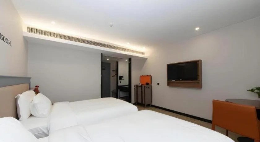 Bed in Premier City Comfort Hotel Yangzhou Shouxi Lake West Gate Weiyang Road Siji Garden