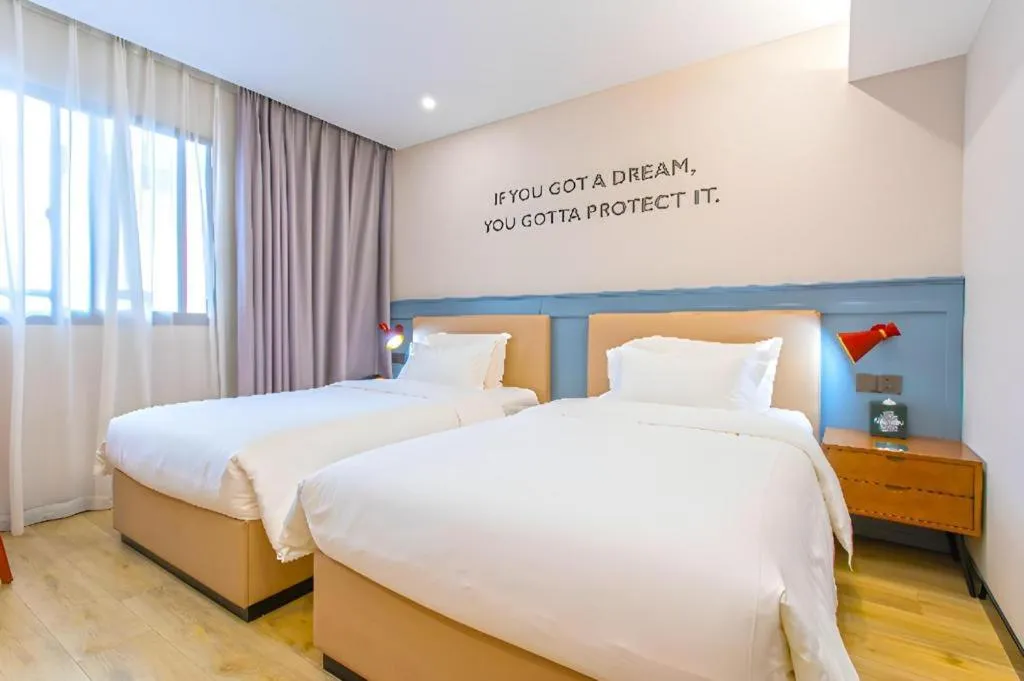 Bed in Premier City Comfort Hotel Yangzhou Shouxi Lake West Gate Weiyang Road Siji Garden