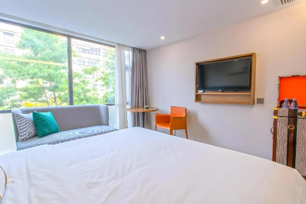 Bed in Premier City Comfort Hotel Yangzhou Shouxi Lake West Gate Weiyang Road Siji Garden