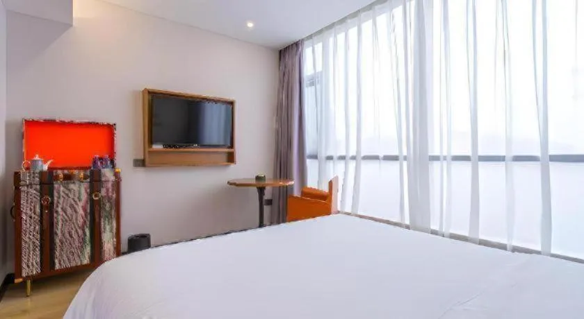 Bed in Premier City Comfort Hotel Yangzhou Shouxi Lake West Gate Weiyang Road Siji Garden