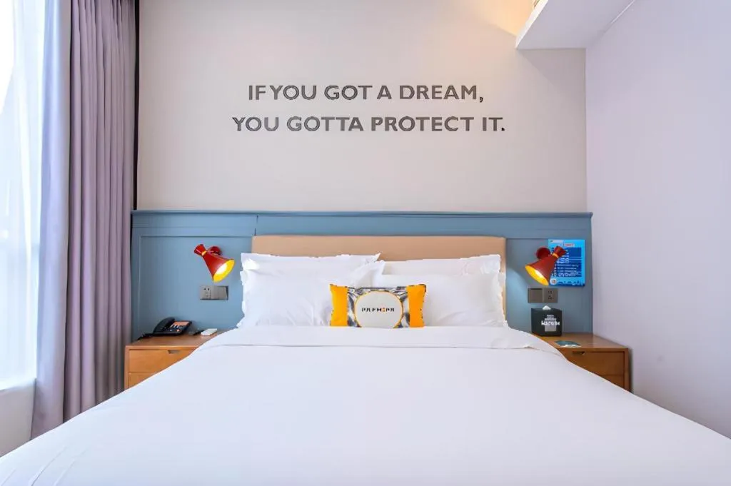 Bed in Premier City Comfort Hotel Yangzhou Shouxi Lake West Gate Weiyang Road Siji Garden